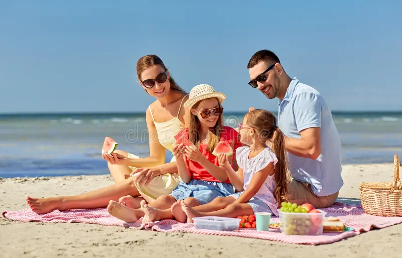 Family Leisure People Concept Happy Mother Father Two Daughters Having Picnic Summer Beach Eating Watermelon Happy 202455215